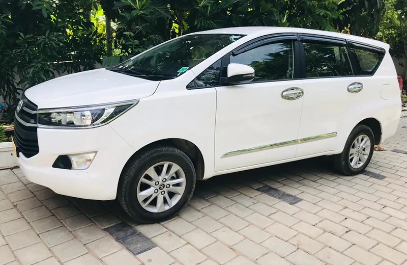 Family travelling by rental MPV across Kerala with Apple Car Rentals
